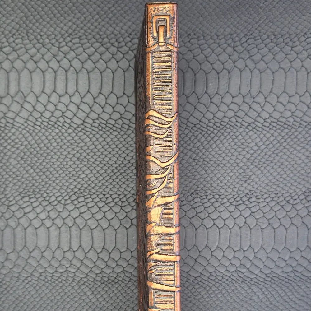 A bronze coloured notebook/journal for DND and other TTRPG games