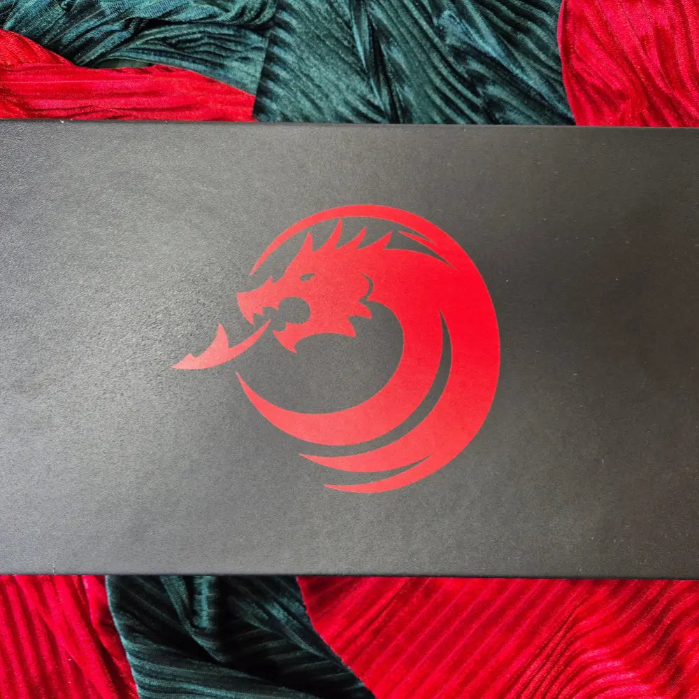 A black-and-red 3-in-1 dice tower, dice tray, and dice storage box with a dragon motif, perfect for tabletop gaming.