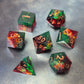A set of Green and red sharp edge dice filled with sparkles and gold numbers.