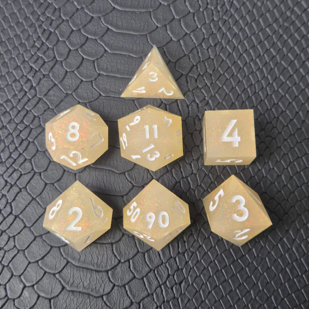 Beige sharp-edge resin dice set with glitters and white numbers