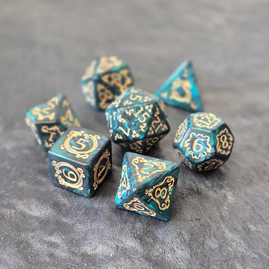 Acrylic D&D dice set with emerald green swirls and antique gold arcane-style numbering, displayed on a textured dark surface.