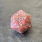 Pink acrylic D20 with white arcane-style numbers and elegant swirls, displayed on a textured grey surface.
